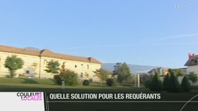 NE: les élus de la Chaux-de-Fonds demandent au canton de trouver une solution pour le logement des requérants d'asile