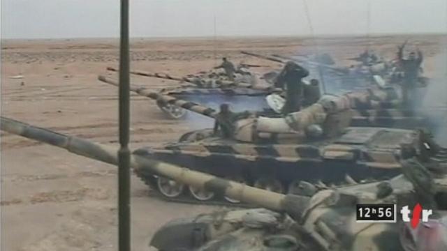 Libye: les forces du colonel Kadhafi sont aux portes de Benghazi, fief de l'opposition.