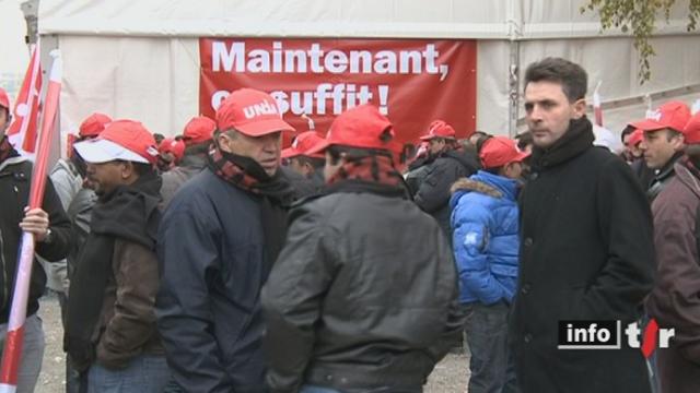 Des travailleurs du secteur de la construction manifestent vendredi dans différentes villes de Suisse