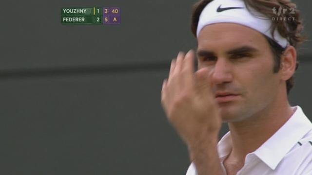 Tennis / Wimbledon / Federer-Youzhny: Jeu, set et match Federer qui après nous avoir fait une petite frayeur dans le 1er set s'impose en 4 manches (6-7, 6-3, 6-3, 6-3)