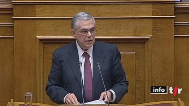 Grèce: le Parlement a adopté un budget 2012 d'une extrême rigueur afin d'assurer son avenir dans une zone euro désormais menacée d'éclatement