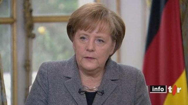 La chancelière allemande Angela Merkel apporte son soutien au président français Nicolas Sarkozy