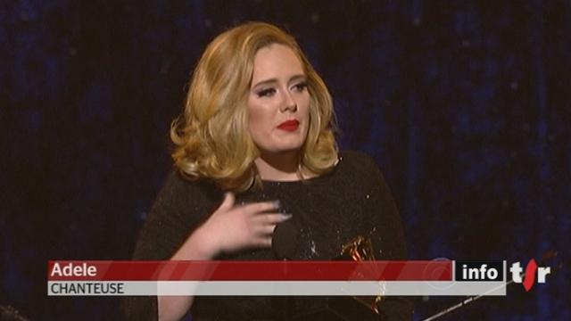 Les Grammy Awards, équivalents des Oscars de la Musique, sacrent la chanteuse britannique Adele, qui décroche 6 récompenses