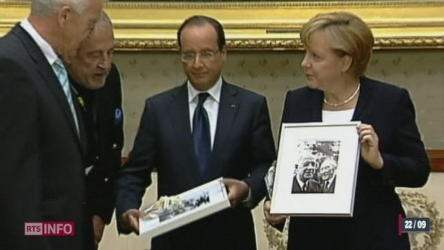 50 ans de la réconciliation franco-allemande: Angela Merkel et François Hollande ont rendu hommage aux artisans du rapprochement