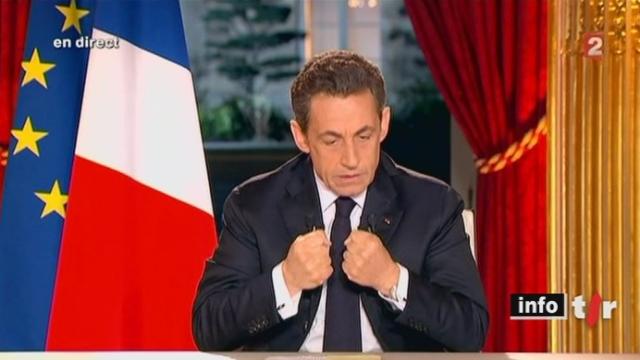 France : en direct à la télévision, le président Sarkozy évoque plusieurs mesures pour faire baisser le cout du travail, sans toutefois annoncer sa candidature