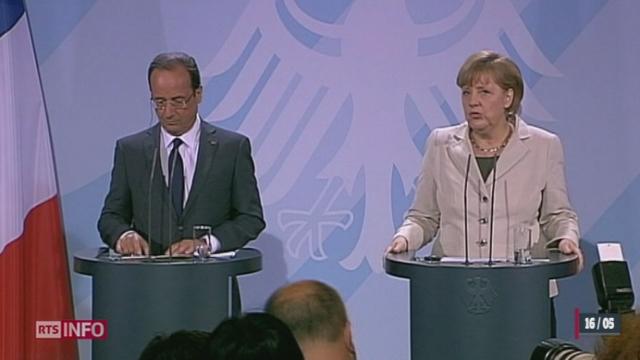 Le président français François Hollande a réservé sa première visite à Angela Merkel, chancelière de l'Allemagne