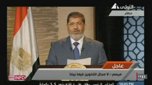 Présidentielles égyptiennes: au lendemain de sa victoire au Caire, Mohammed Morsi fait ses premiers pas de chef d'Etat