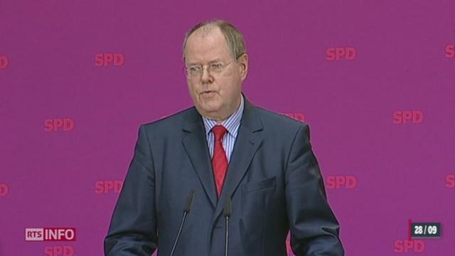 Allemagne: Peer Steinbrück, le pourfendeur du secret bancaire suisse, se lance dans la course aux élections législatives contre la Chancelière Angela Merkel