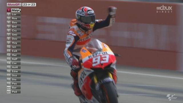 MotoGP. Dernier tour. Marc Marquez (ESP) devant son compatriote Jorge Lorenzo et Valentino Rossi (IT)