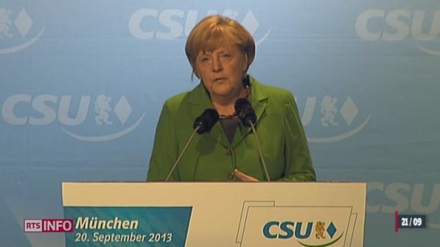 Elections législatives allemandes: Angela Merkel bénéficierait d'une courte avance