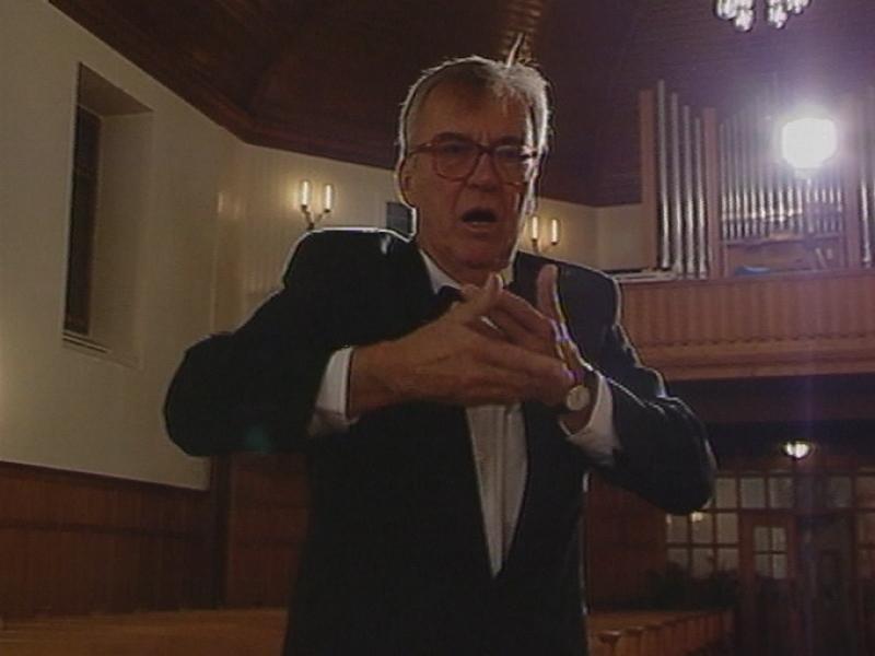Portrait du chef de choeur André Charlet en 1996. [RTS]