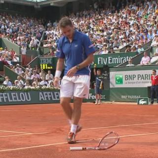 ¼, Wawrinka - Nadal (1-5): Wawrinka peine à trouver la solution et en casse sa raquette.