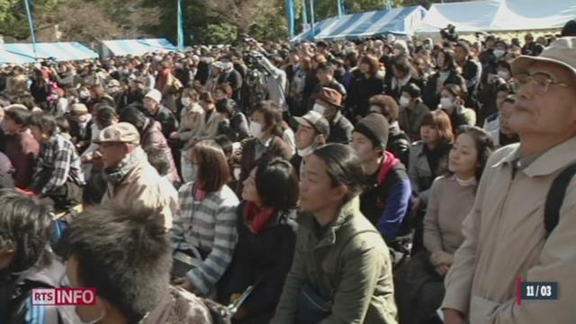 Le Japon commémore le 2ème anniversaire du tsunami à l'origine de la catastrophe de Fukushima