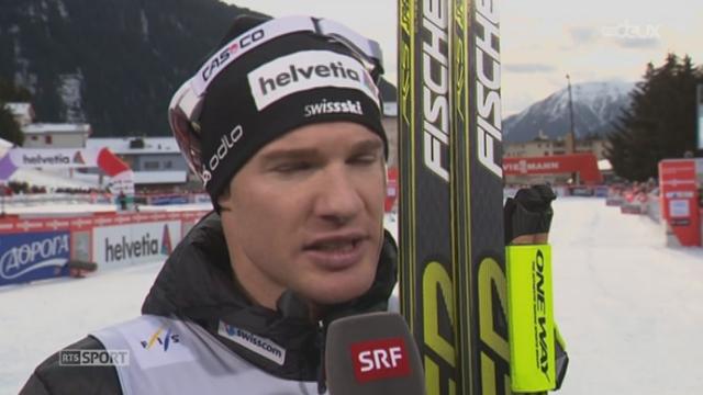 Ski nordique: Dario Cologna monte sur la boîte au 30km de Davos