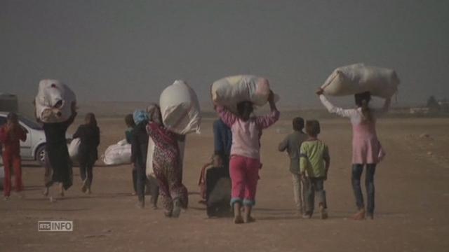 Les refugies syriens fuient les djihadistes en Syrie