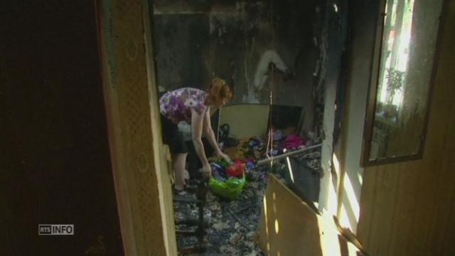 Des civils victimes de bombardements à Donetsk