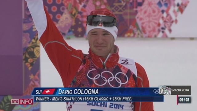Dario Cologna remporte la médaille d'or au skiathlon