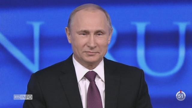 Russie: Vladimir Poutine se montre rassurant sur la crise monétaire qui touche son pays