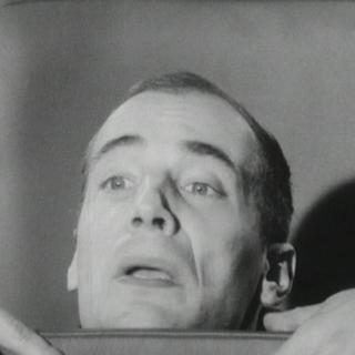 Bernard Haller joue le présentateur de Carrefour en 1964. [RTS]
