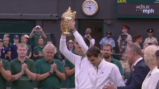 Finale messieurs. Novak Djokovic (SRB-1) - Roger Federer (SUI-2) [7-6 (7-1) 6-7 (10-12) 6-4 6-3]. La remise du trophée