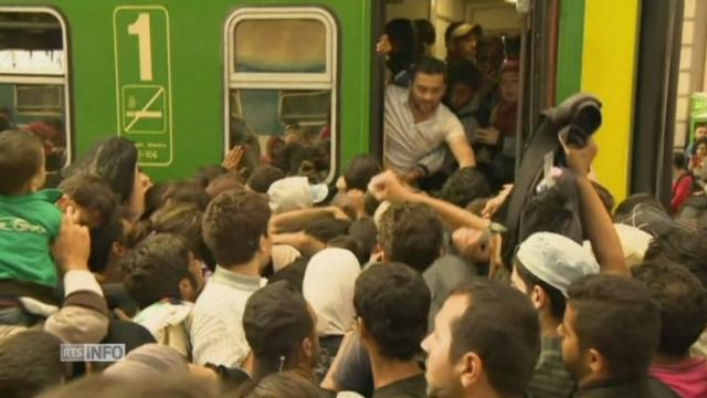 Trains pris d'assaut par des migrants à Budapest