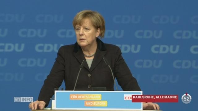 Crise des migrants: Angela Merkel défend une solution européenne à la crise face à son parti