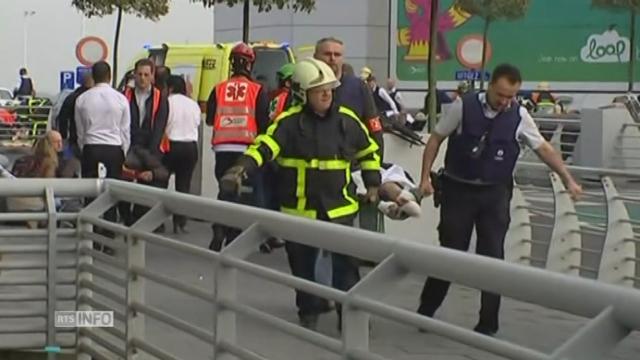 Images de l'évacuation des blessés à l'aéroport et premiers témoignages