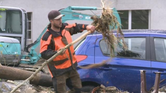 Les dégâts causés par les précipitations dans le village de La Roche (FR)