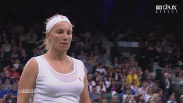 Dames. 1er tour: Caroline Wozniacki (DEN) - Svetlana Kuznetsova (RUS-13) (5-7). La 1re manche à la Russe en 51 minutes