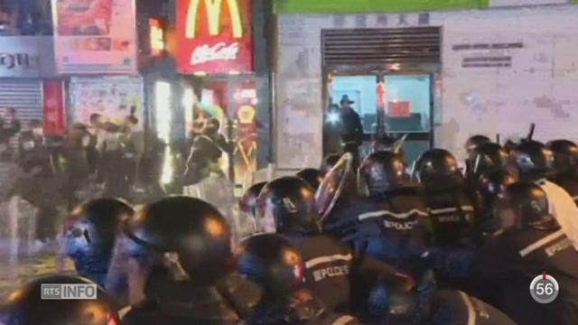 Hong-Kong: la police a fait dix blessés en tirant des coups de semonce sur des émeutiers