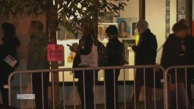 Les premiers électeurs font la queue devant les bureaux de vote américains