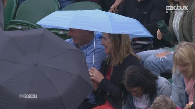 La pluie se met à tomber sur Wimbledon - Les matchs, dont Verdasco (ESP) - Tomic (AUS), sont interrompus, sauf sur le court central (couvert)