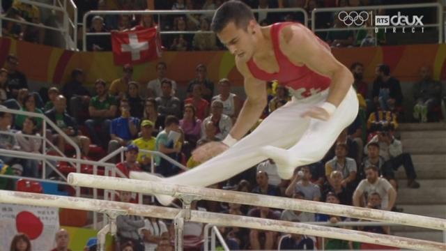 Gym. Concours général. Finale. Le Suisse Pablo Brägger aux barres parallèles