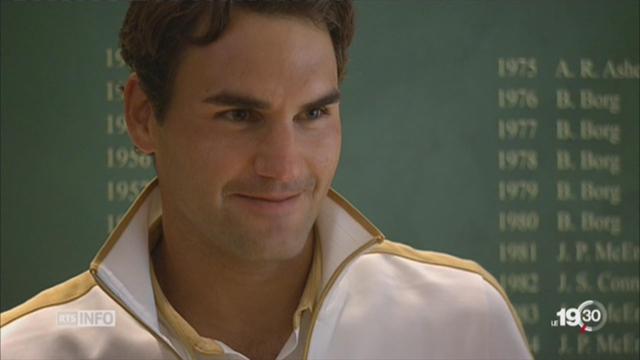 Roger Federer court après un 8ème titre à Wimbledon
