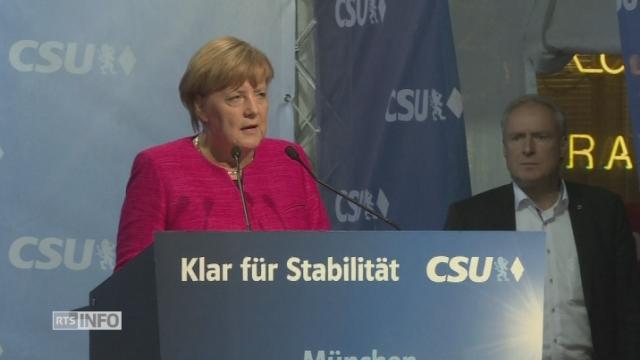 Angela Merkel sous les sifflets de ses opposants à Munich