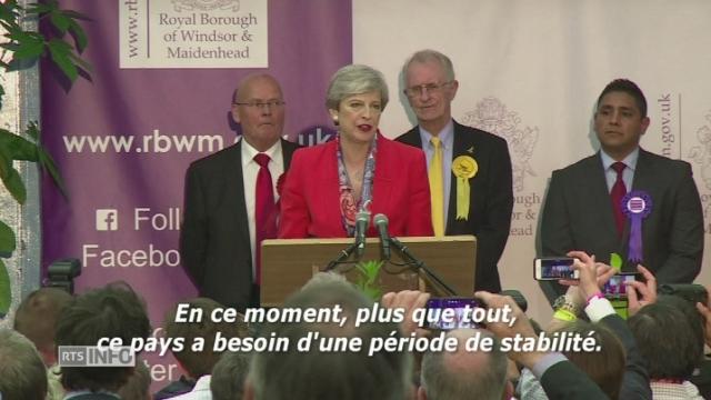 Theresa May promet d'assurer la stabilité