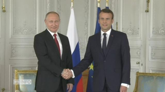 Les images de la rencontre entre Vladimir Poutine et Emmanuel Macron à Versailles