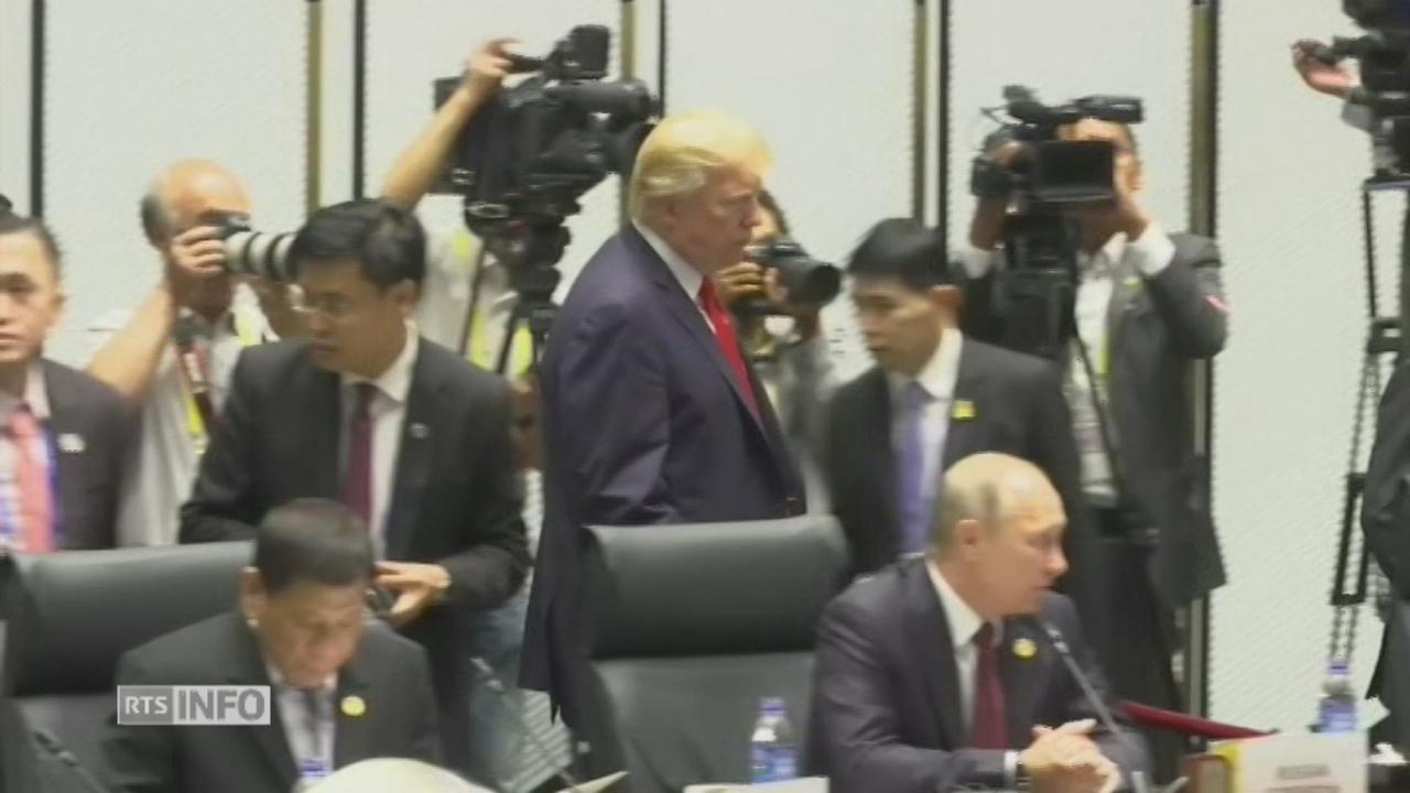 Poignée de main entre Donald Trump et Vladimir Poutine à Danang