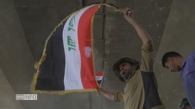 Les troupes irakiennes célèbrent la libération de Mossoul