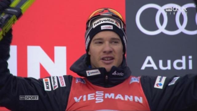 9 km messieurs: la joie de Dario Cologna (SUI) sur le podium