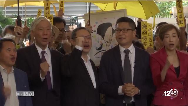 Le procès de la révolte des parapluies s'ouvre à Hong Kong. Des militants des libertés risquent la prison ferme.