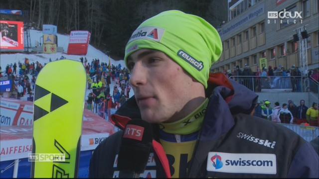 Wengen (SUI), 1re manche de slalom: Daniel Yule (SUI) au micro de la RTS