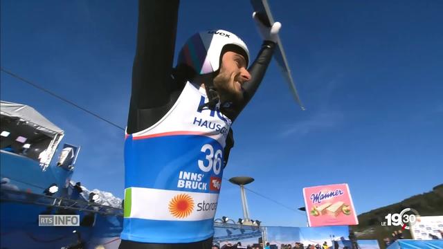 Saut à ski: Killian Peier remporte la médaille de bronze aux Championnats du monde sur le grand tremplin à Innsbruck.