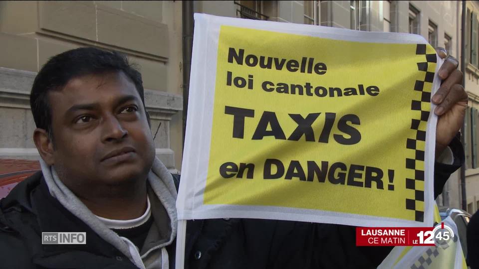 Les taxis vaudois protestent contre le projet de loi voté par le Grand Conseil à Lausanne.