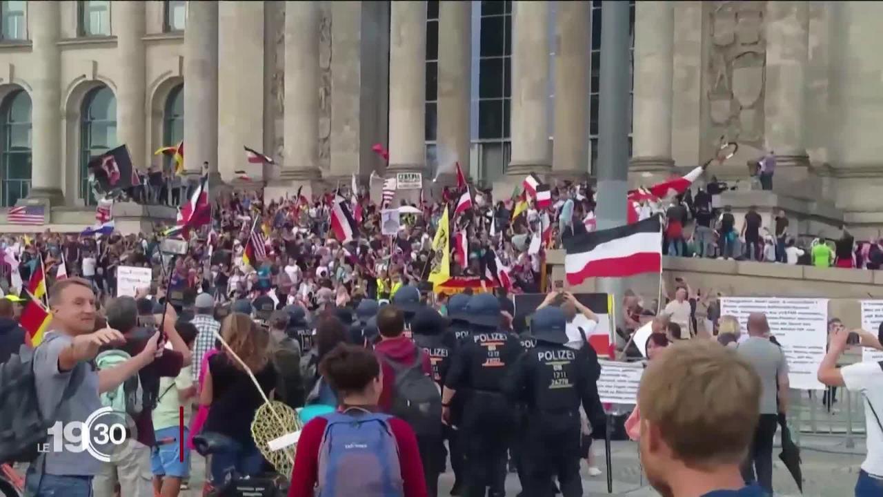 Insignes nazis et Reichstag pris d'assaut: l'Allemagne sous le choc suite aux débordements d'une manifestation anti-masques