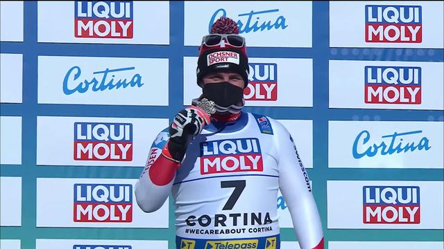 Cortina (ITA), descente messieurs: la joie de Beat Feuz (SUI) en recevant sa médaille de bronze