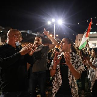 Des manifestants palestiniens à 'Umm al-Fahm, Israël, le 19 mai 2021- [AFP - Ahmad Gharabli]