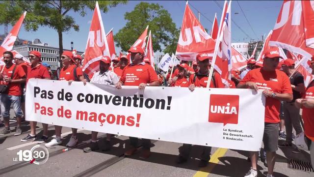 Des milliers de maçons et d'ouvriers ont défilé à Zurich pour réclamer de meilleures conditions de travail