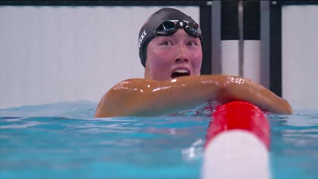 Finale, 100m, papillon (femmes): Husk (USA) et Walsh (USA) d'or et d'argent, Zhang (CHN) s'empare du bronze