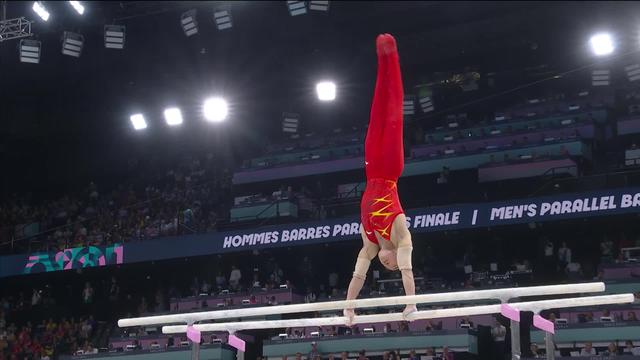 Barres parallèles, finale messieurs: Le Chinois J. Zou déclasse ses concurrents et remporte l'or olympique